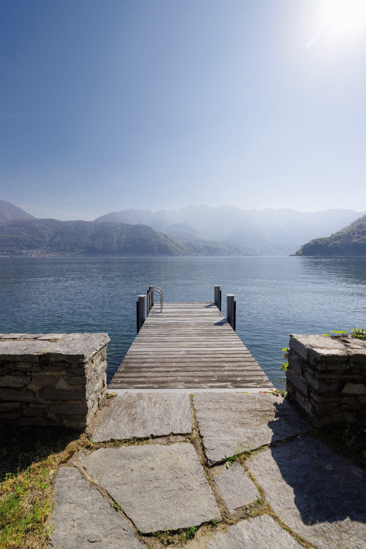 Wooden jetty over Lake Lugano